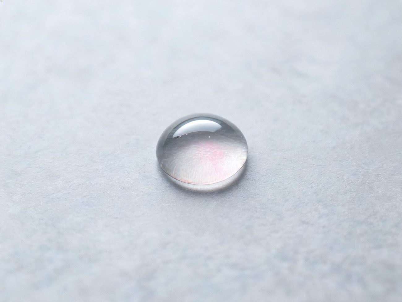Macro of a luminous serum droplet